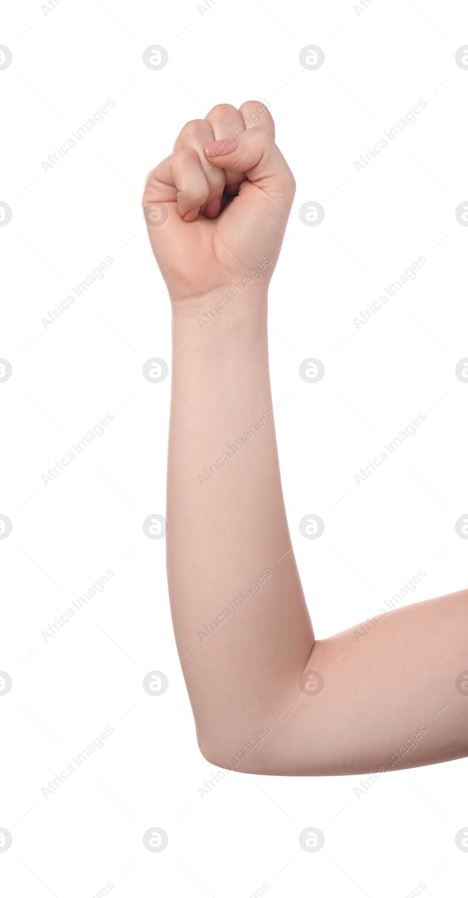 Photo of Playing rock, paper and scissors. Woman showing fist on white background, closeup