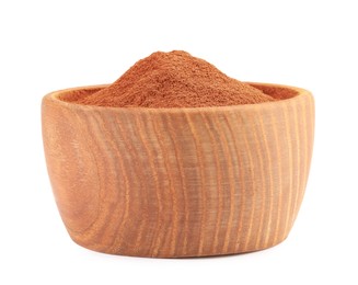 Photo of Dry aromatic cinnamon powder in wooden bowl isolated on white