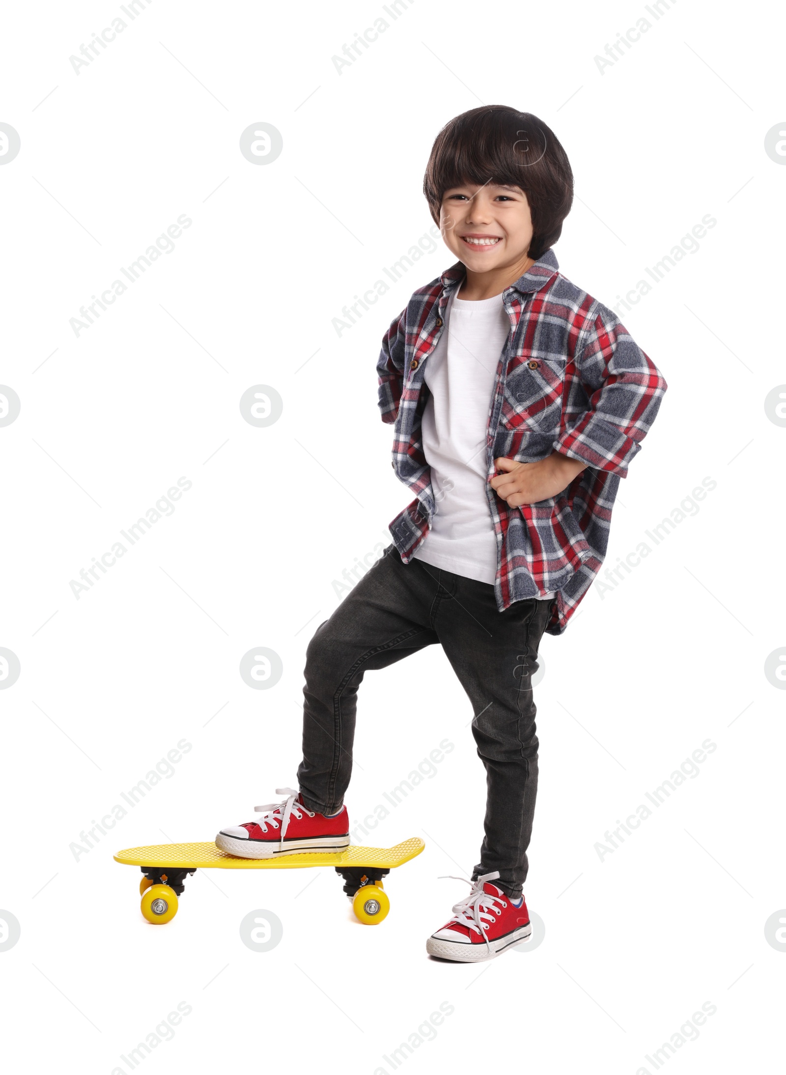 Photo of Cute little boy with skateboard on white background