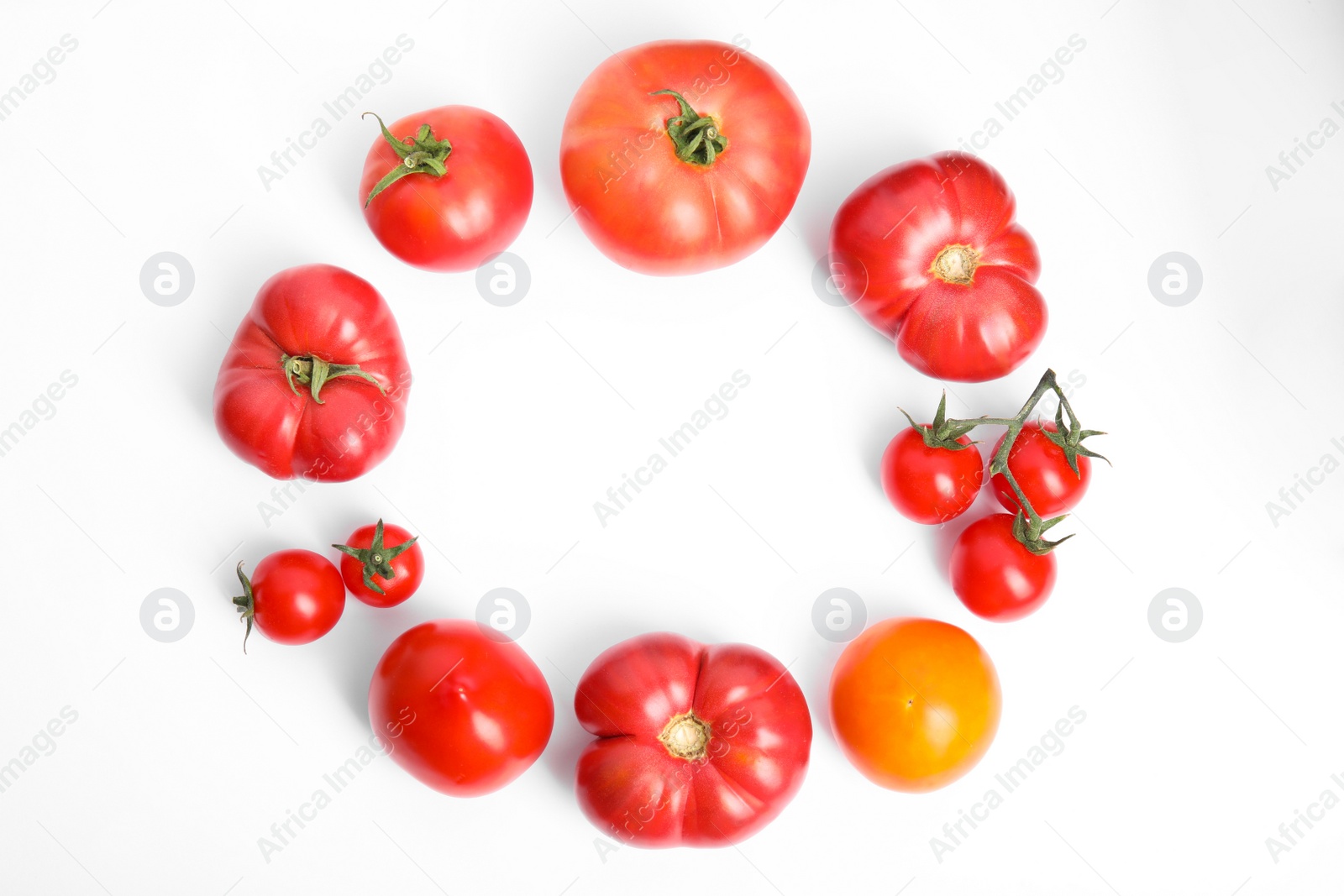 Photo of Frame of different ripe tomatoes on white background, flat lay. Space for text