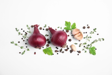 Photo of Beautiful composition with ripe red onions on white background