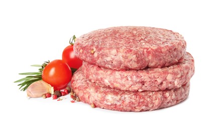 Photo of Raw hamburger patties with rosemary, vegetables and pepper on white background
