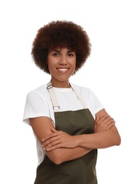 Portrait of happy young woman in apron on white background