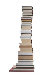 Photo of High stack of many different books isolated on white