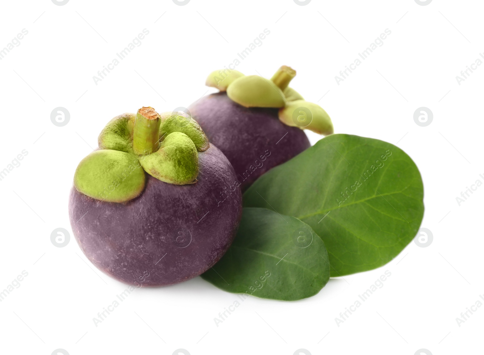 Photo of Delicious ripe mangosteens and green leaves on white background