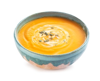 Photo of Delicious pumpkin cream soup in bowl on white background