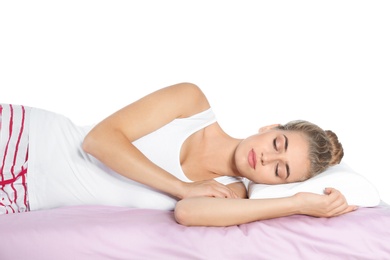 Photo of Beautiful woman sleeping with orthopedic pillow on bed against white background