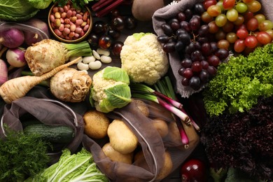 Photo of Different fresh ripe vegetables and fruits on wooden table, flat lay