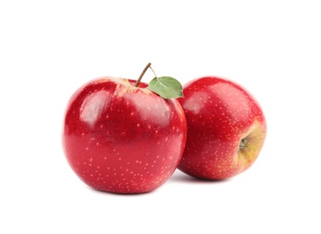 Photo of Ripe juicy red apples with leaf on white background