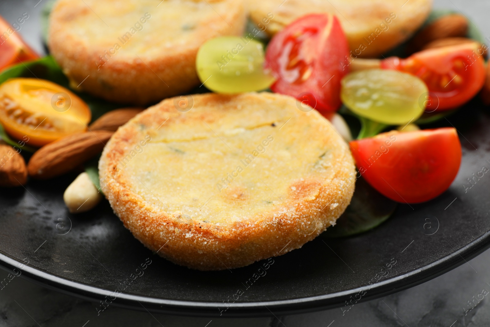 Photo of Plate with healthy dish high in vegetable fats on table, closeup