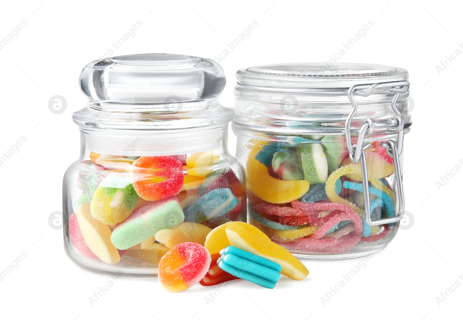 Photo of Tasty jelly candies in jars on white background