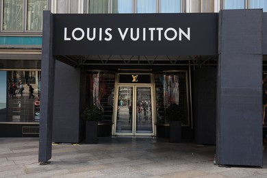 Cologne, Germany - August 28, 2022: Entrance of Louis Vuitton fashion store outdoors