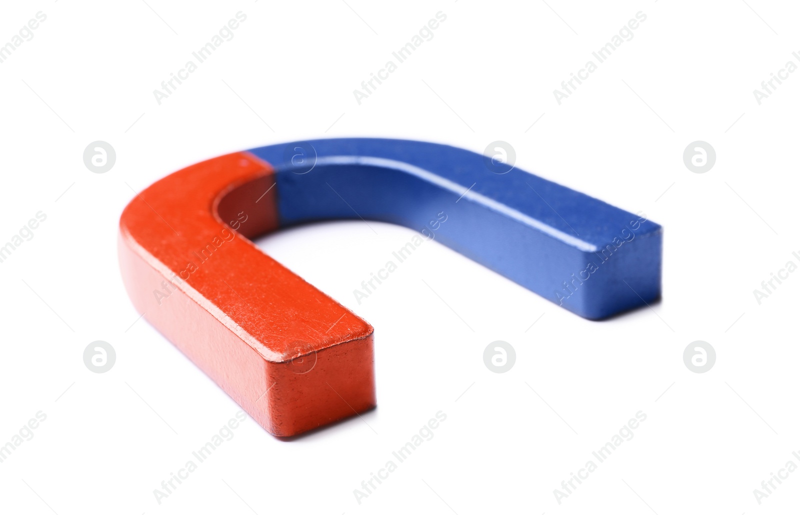 Photo of Red and blue horseshoe magnet on white background