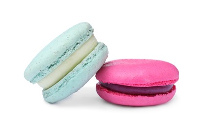 Photo of Different delicious colorful macarons on white background