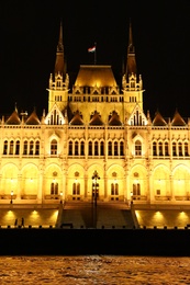 Photo of BUDAPEST, HUNGARY - APRIL 27, 2019: Beautiful night cityscape with illuminated Parliament Building