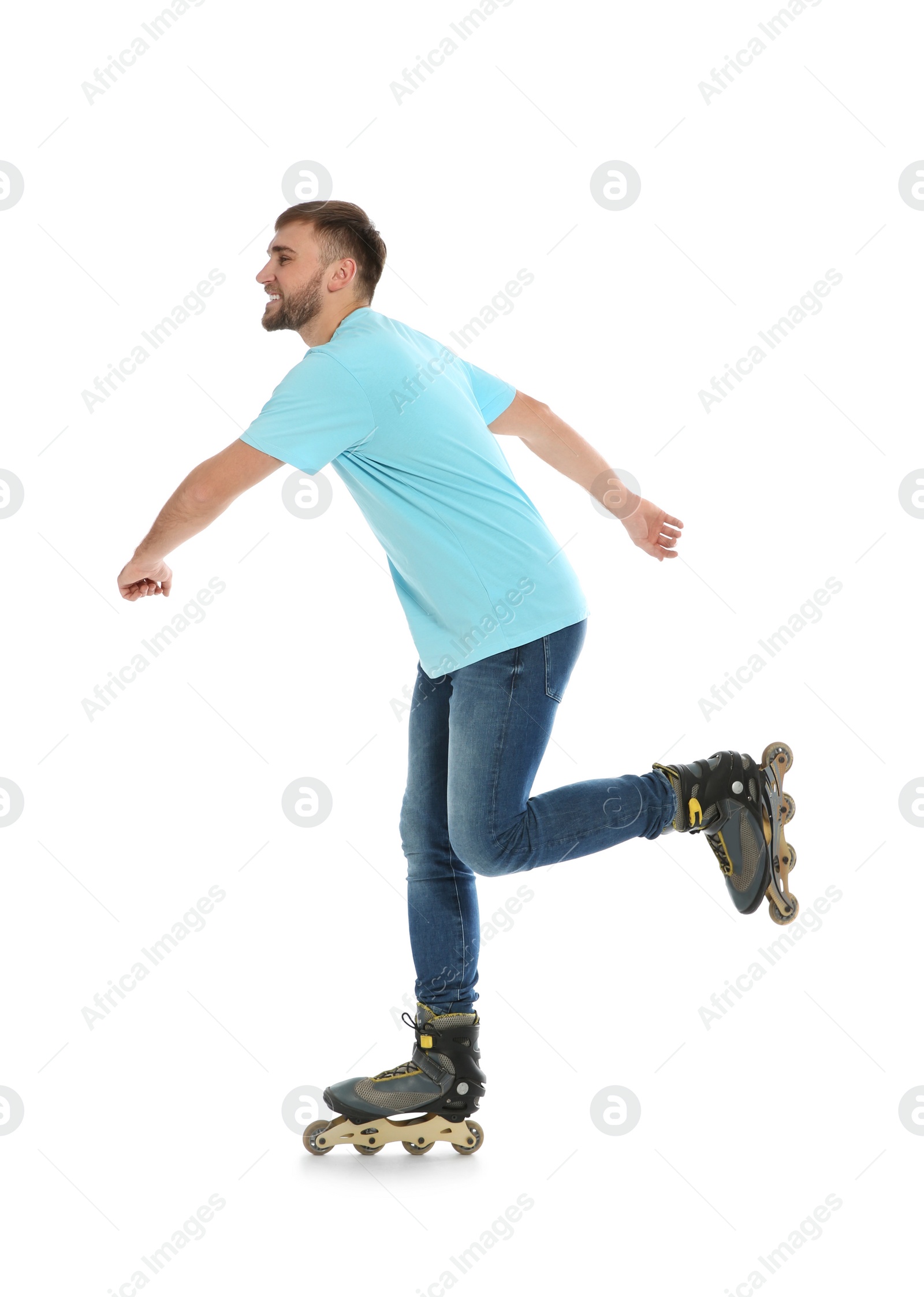 Photo of Young man with inline roller skates on white background