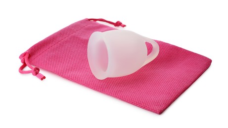 Photo of Silicone menstrual cup with pink bag on white background