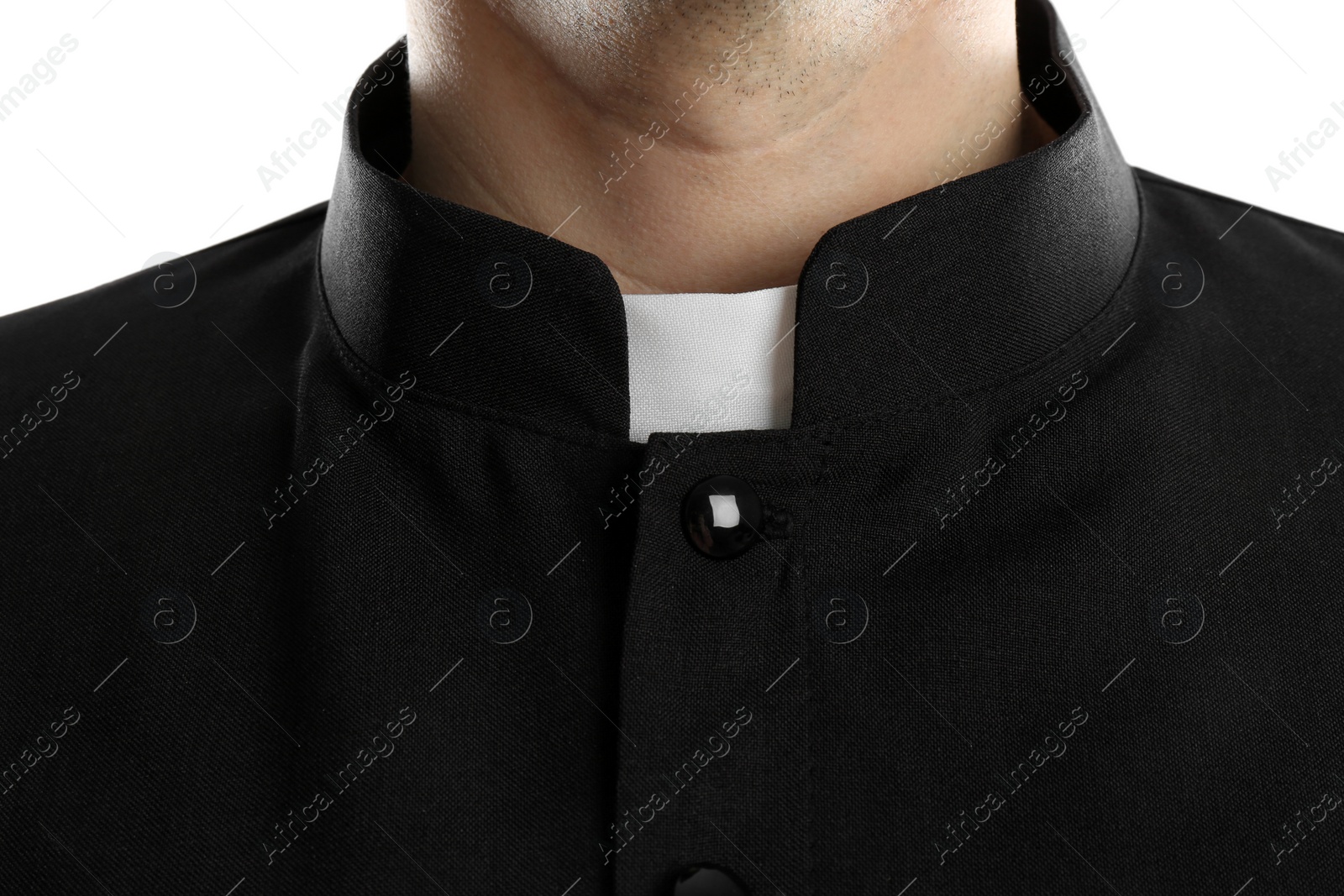 Photo of Priest wearing cassock with clerical collar on white background, closeup