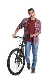 Handsome young man with modern bicycle on white background