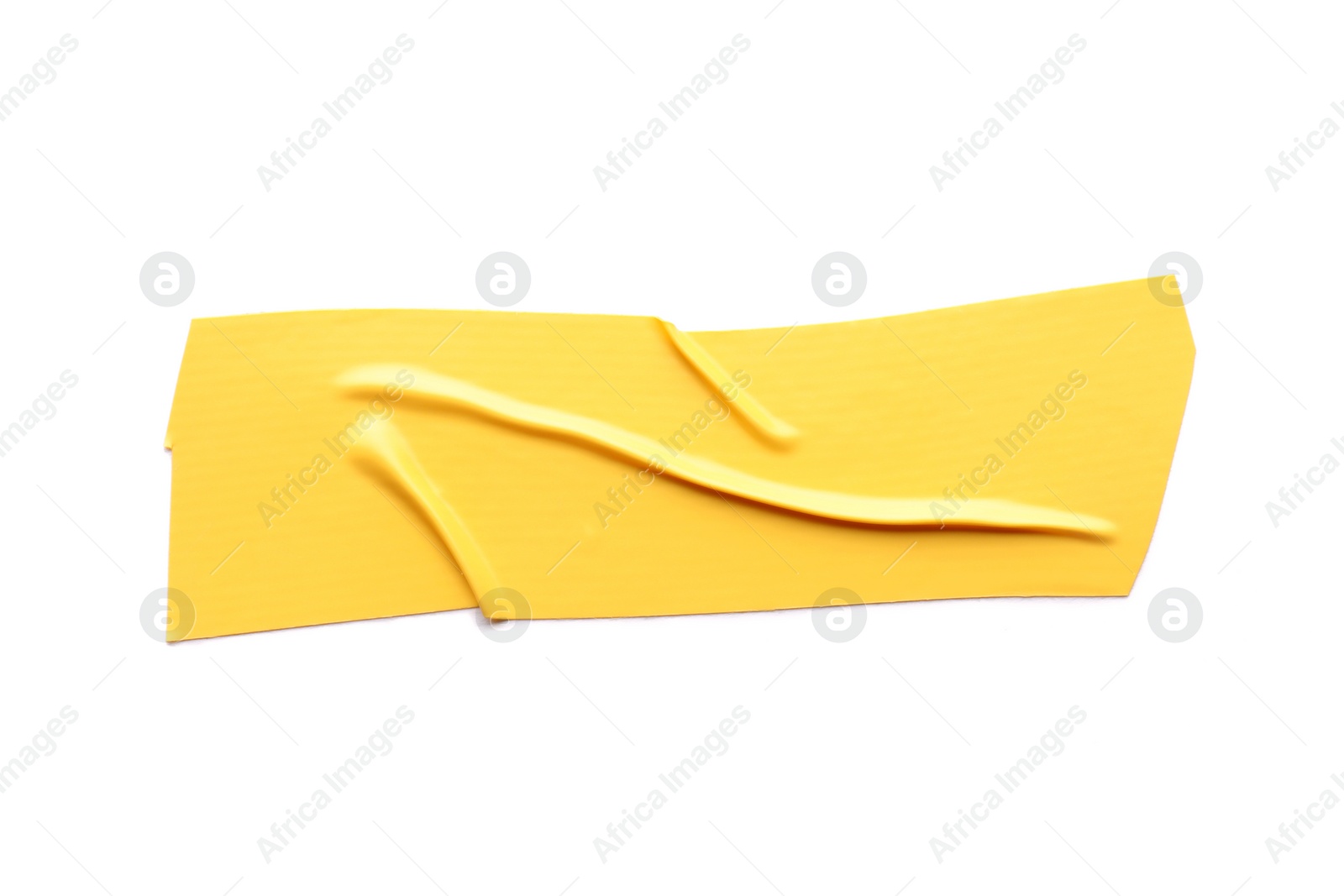 Photo of Piece of yellow insulating tape isolated on white, top view