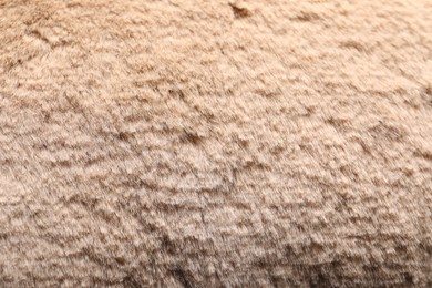 Photo of Texture of brown faux fur as background, closeup