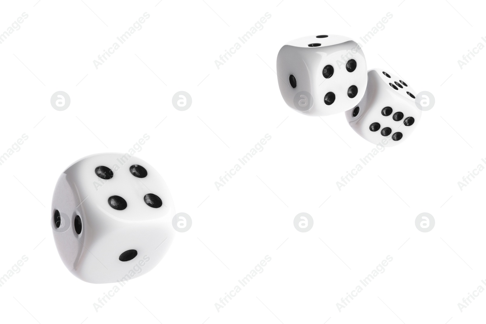 Image of Three dice in air on white background