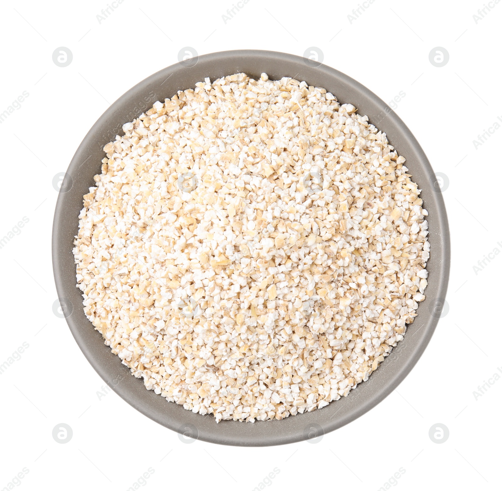 Photo of Dry barley groats in bowl isolated on white, top view