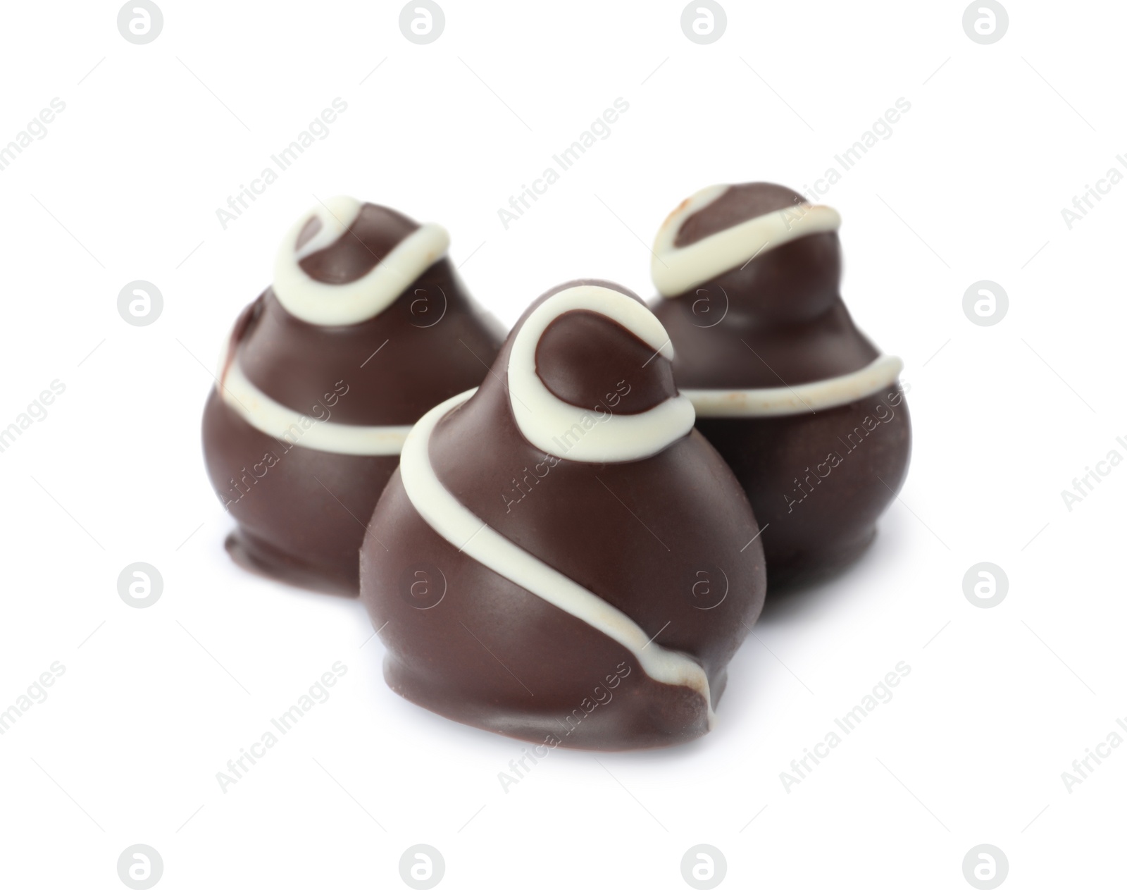 Photo of Many delicious sweet chocolate truffles on white background