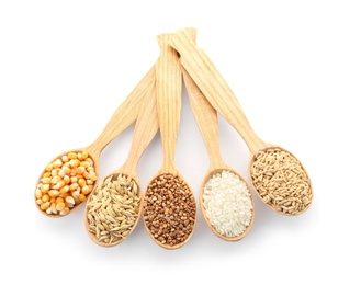 Photo of Spoons with different types of grains and cereals on white background