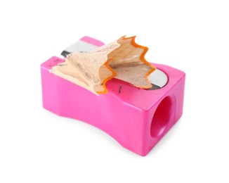 Photo of Pink sharpener with pencil shavings on white background