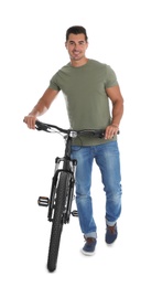 Handsome young man with modern bicycle on white background