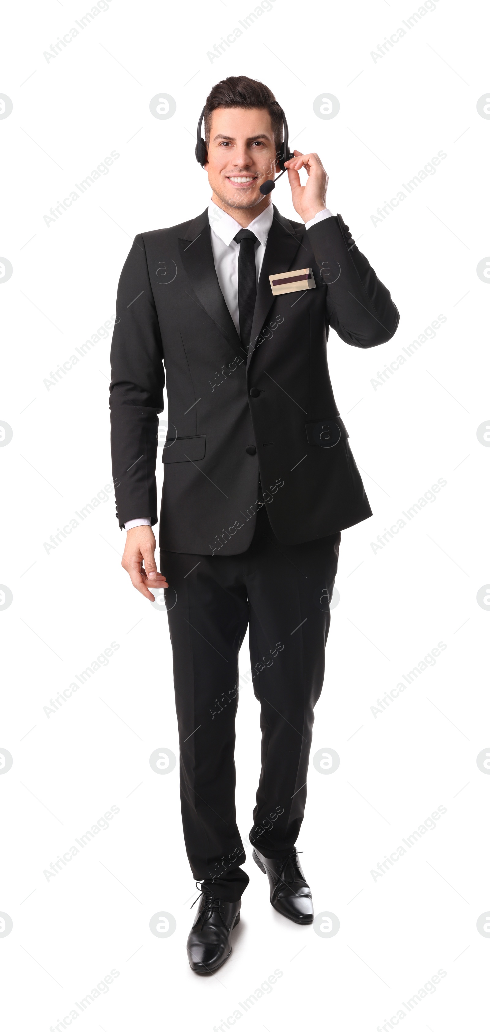 Photo of Full length portrait of receptionist with headset on white background