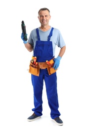 Electrician with drill wearing uniform on white background