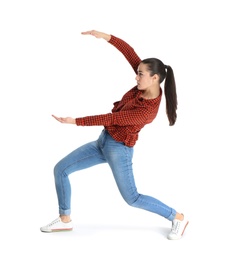 Photo of Young woman with magnet attracting people on white background