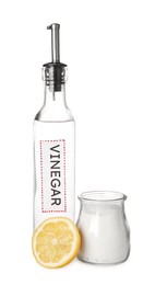 Photo of Eco friendly natural cleaners. Vinegar in bottle, cut lemon and jar of soda isolated on white