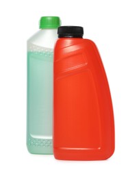 Photo of Antifreeze in plastic bottles isolated on white