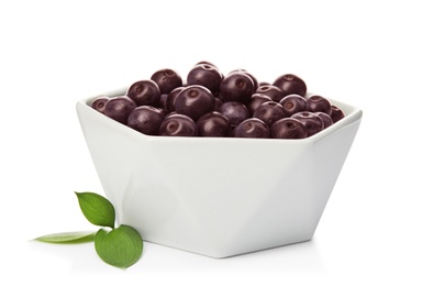 Photo of Bowl with fresh acai berries on white background