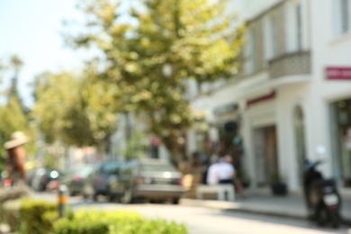 Photo of Blurred view of city street on sunny day