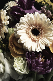 Photo of Beautiful fresh flowers as background, closeup. Floral card design with dark vintage effect