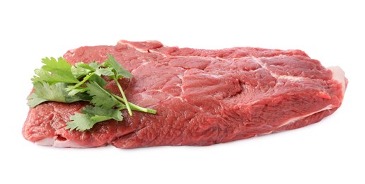 Photo of Piece of raw beef meat with parsley isolated on white