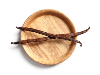 Photo of Plate with aromatic vanilla sticks on white background