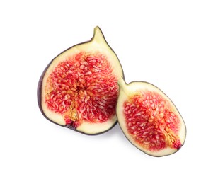 Photo of Pieces of ripe fresh fig isolated on white