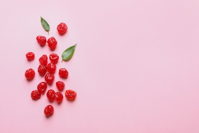 Photo of Cherries on color background, top view with space for text. Dried fruit as healthy snack