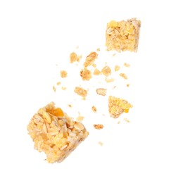 Image of Granola bar breaking in air on white background