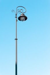 Photo of Beautiful street lamp outdoors on sunny day
