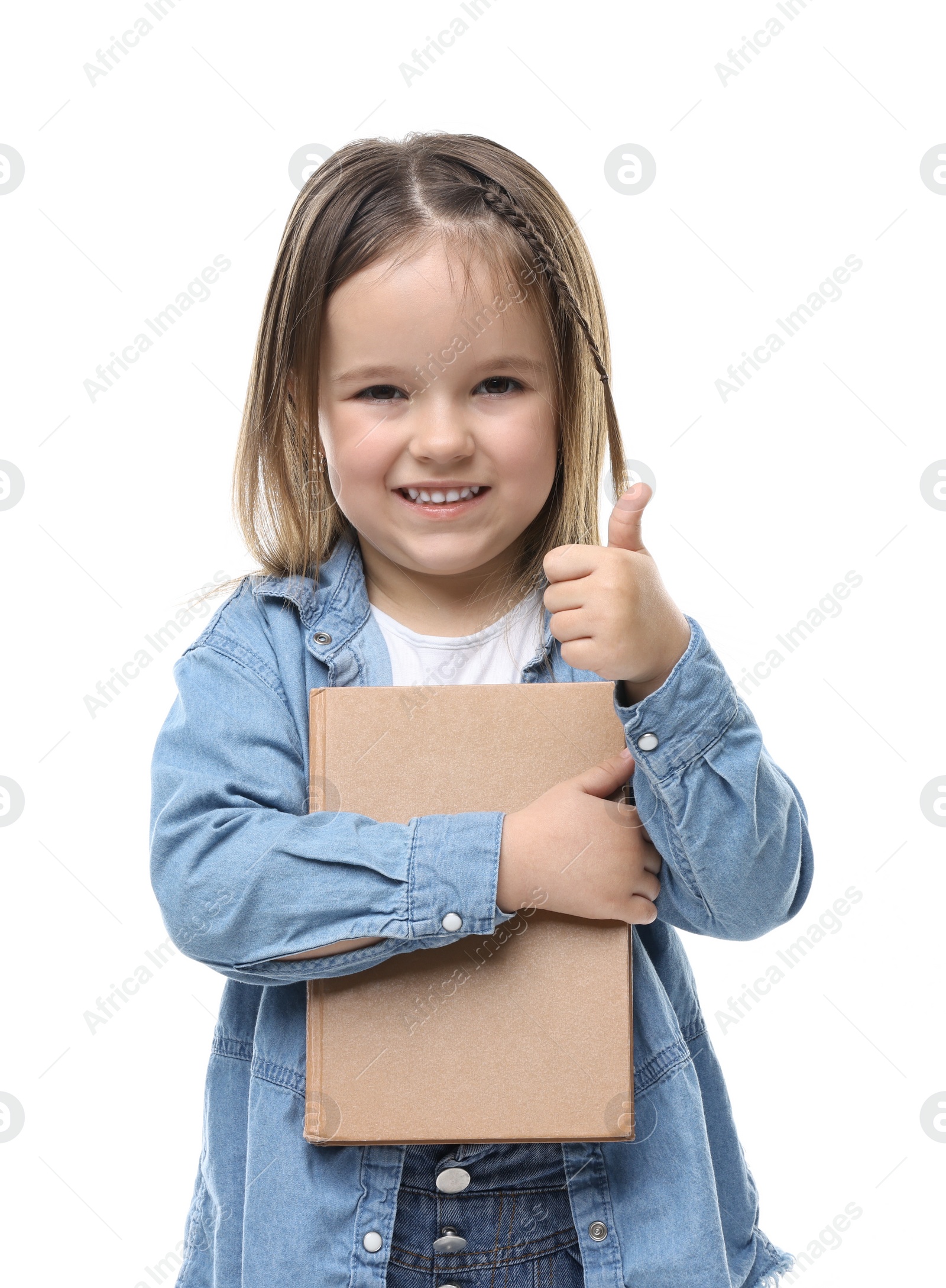 Photo of Cute little girl with book showing thumbs up against white background