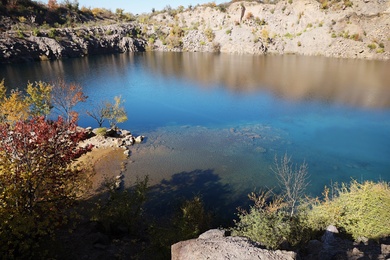 Picturesque view of beautiful lake surrounded by rocky hills