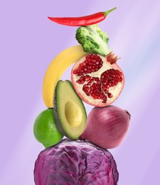 Stack of different vegetables and fruits on pale violet background