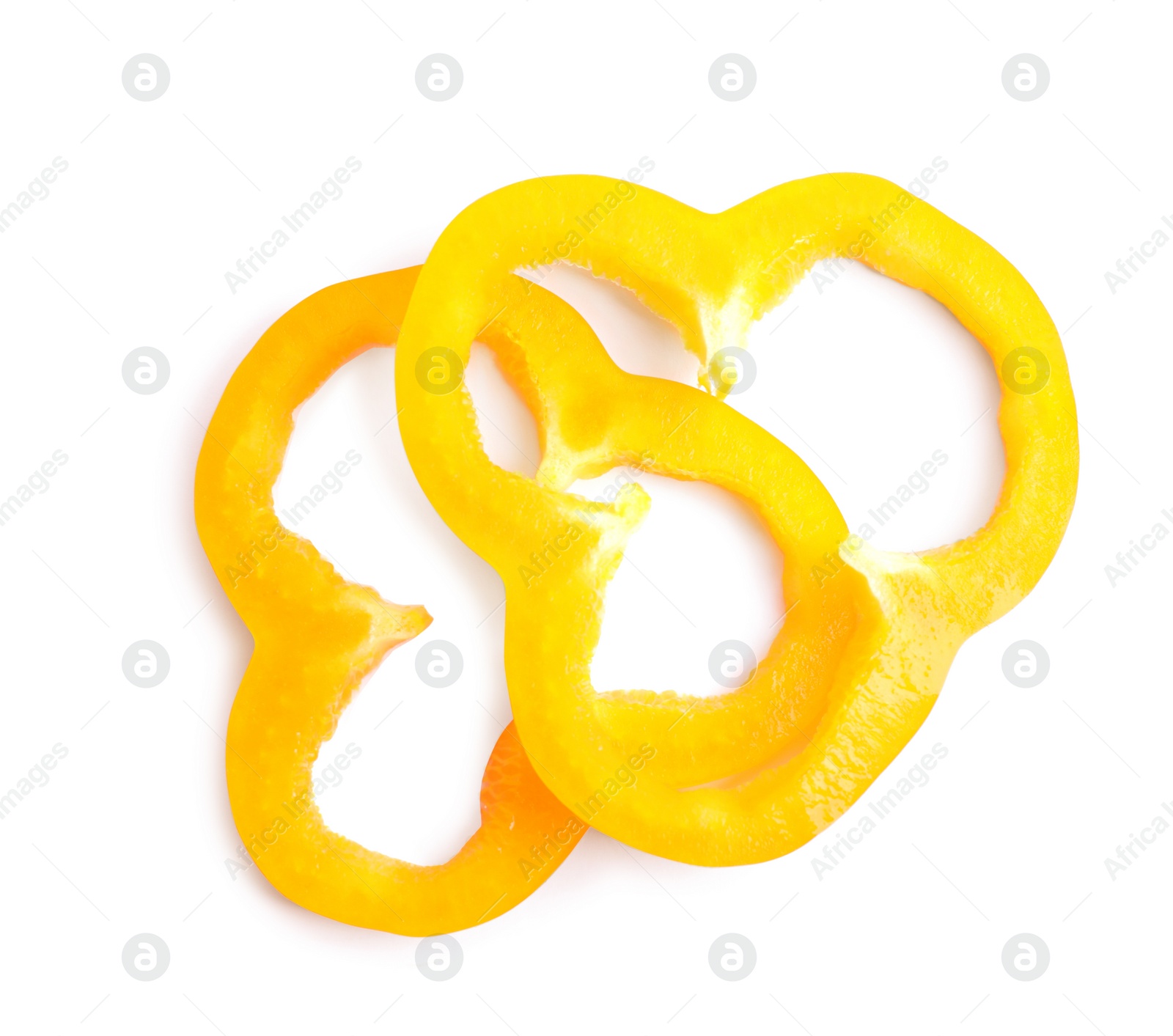 Photo of Slices of orange bell pepper isolated on white