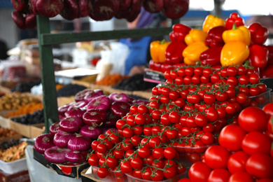 Fresh ripe vegetables on counter at wholesale market